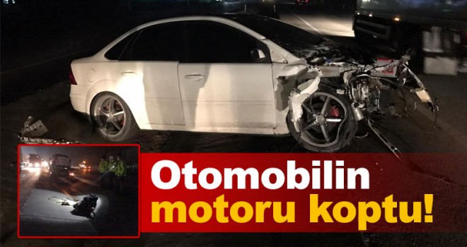 Tıra çarpan otomobilin motoru 25 metre uzağa fırladı