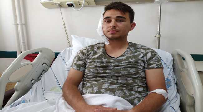 Tartıştığı kişi tarafından kulağı ısırılarak koparılan postacının tedavisi sürüyor