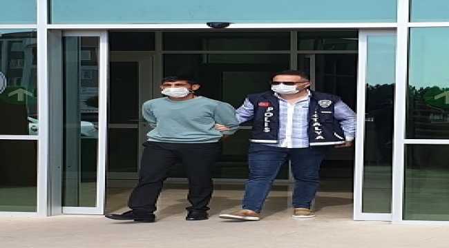 Antalya'da aranan dolandırıcı bankada işlem yaparken yakalandı