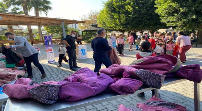 KÜRSAD'dan ihtiyaç sahibi 200 çocuğa mont yardımı