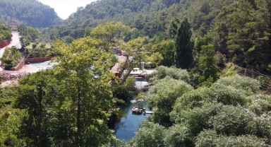 Alanya'nın doğal güzelliği Dim Çayı ziyaretçilerini yaz sıcaklığında serinletiyor