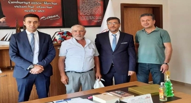 Beypazarı İlçe Milli Eğitim Müdürü Yılmaz'a şehit babası Tiftik'ten ziyaret 