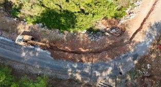 Antalya Büyükşehir Belediyesi'nden Kırsal Bölgelere Ulaşım Hamlesi: Finike'de Yol Yapım Çalışmaları Tamamlanıyor