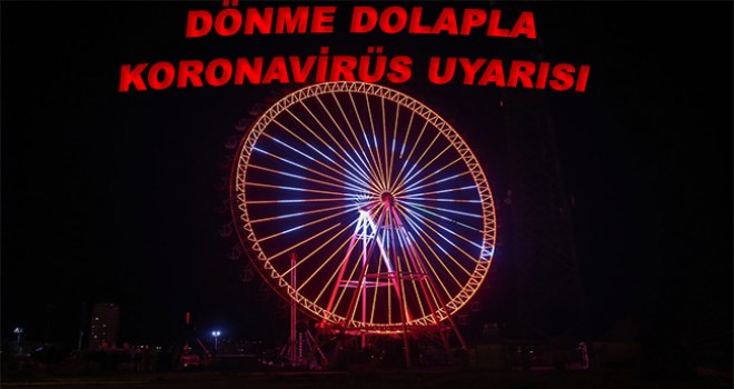 Antalya'da 90 metre yüksekliğindeki dönme dolaptaki ışıklandırmayla koronavirüs uyarısı