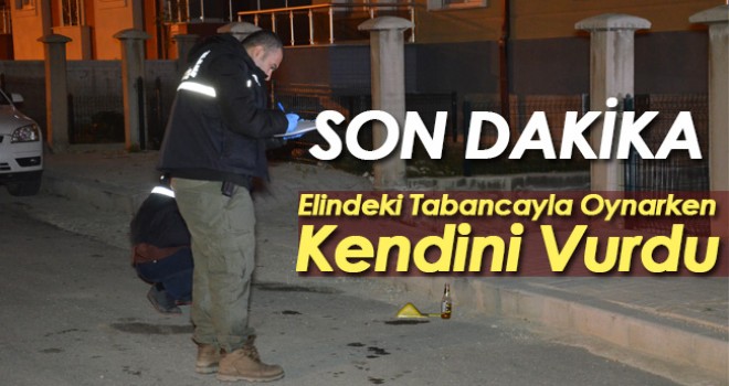 Elindeki tabancayı kurcalarken kendini vurdu