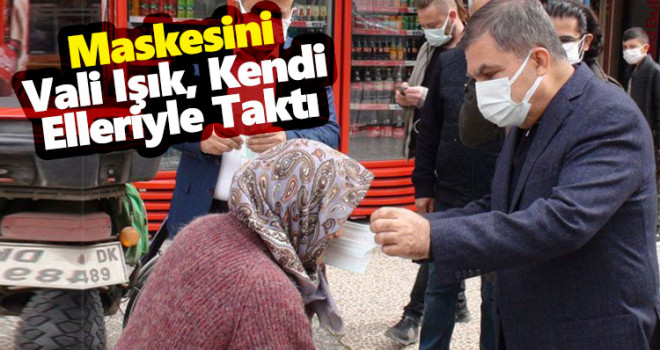 Maskesiz dışarı çıkan kadına Vali kendi elleriyle maske taktı
