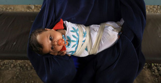 Afgan kız bebek, ailesi tarafından 500 dolara satıldı